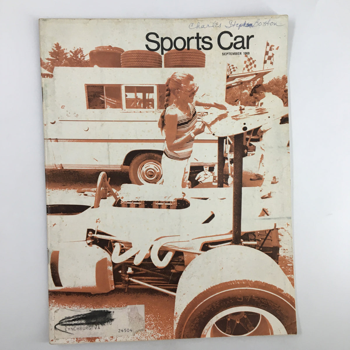 Cover of VTG Sports Car Magazine September 1969 featuring a girl painting near a racing car with vintage tires in the background.