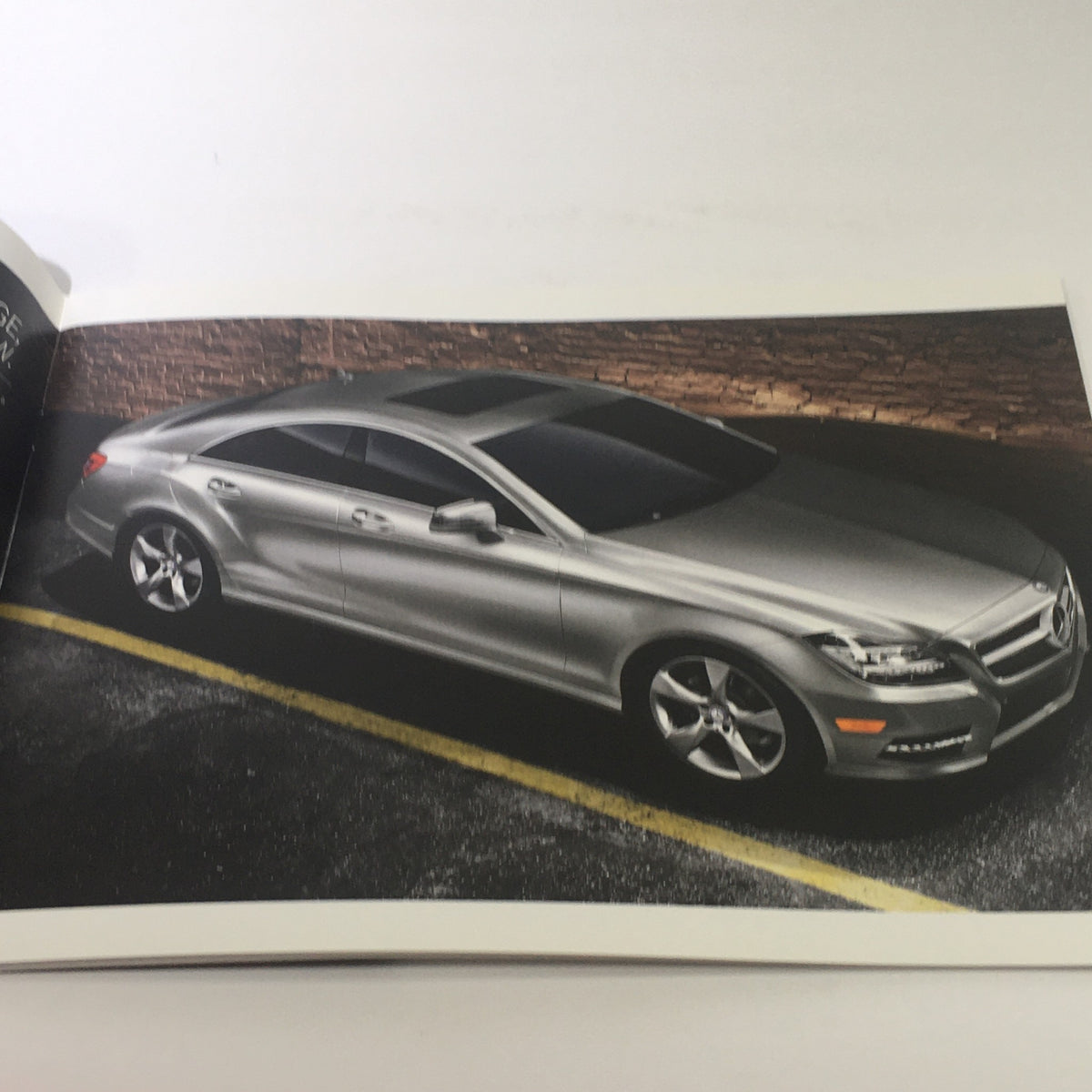 2013 Mercedes-Benz CLS-Class Dealership Car Auto Brochure Catalog featuring a silver Mercedes-Benz CLS-Class parked on a street.