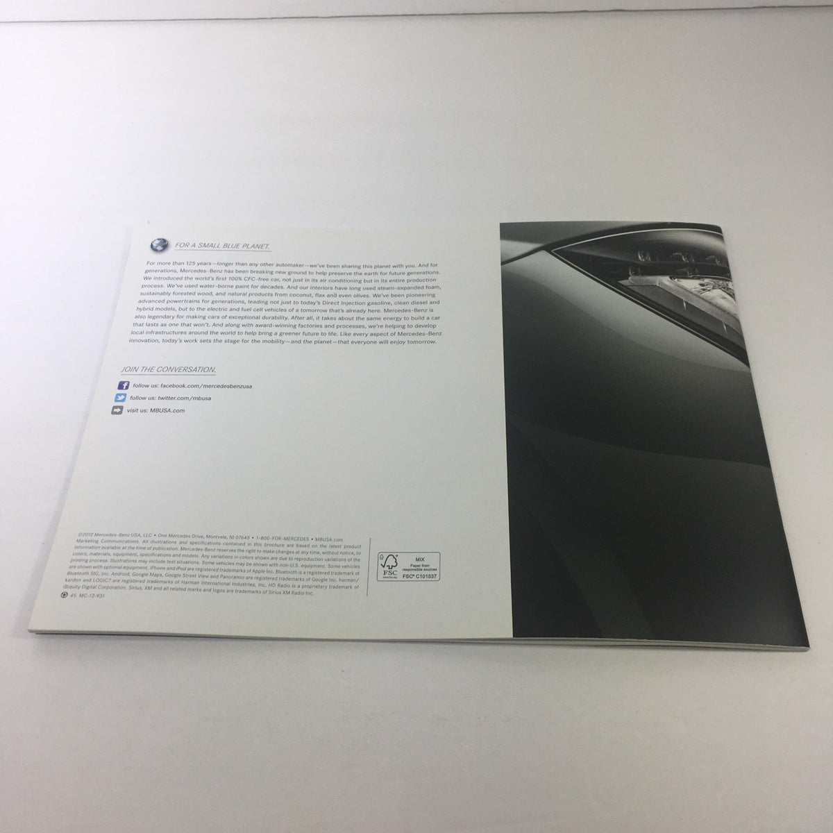 Back cover of the 2013 Mercedes-Benz CLS-Class Dealership Car Auto Brochure Catalog showcasing the design and contact information.