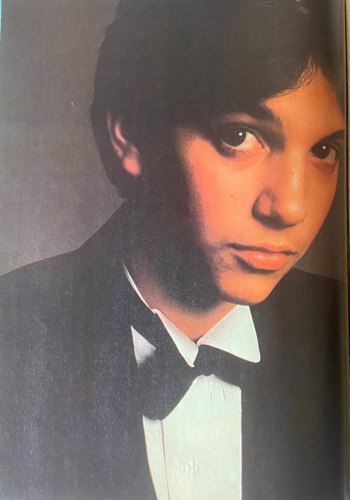 Black and white portrait of a young celebrity in a tuxedo from Teen Beat Magazine September 1983.