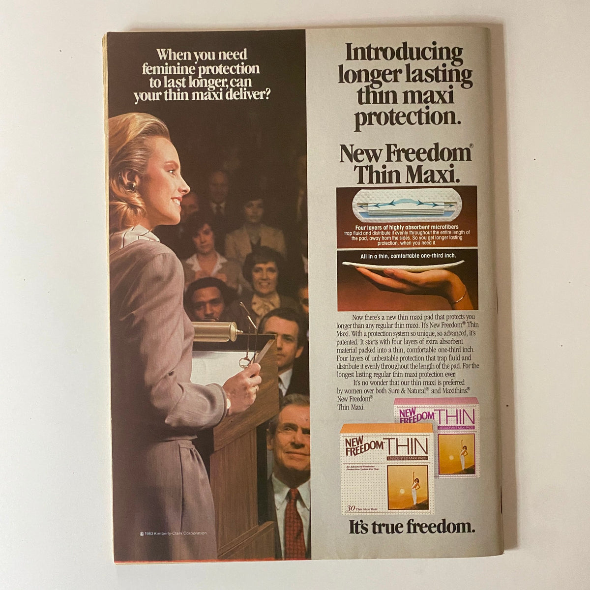 Advert for New Freedom Thin Maxi featuring a speaker at a podium, from Teen Beat Magazine October 1983.