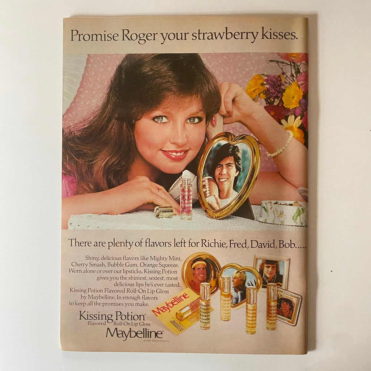 Vintage Maybelline advertisement from Teen Beat Magazine April 1982 promoting Kissing Potion, a flavored roll-on lip gloss.