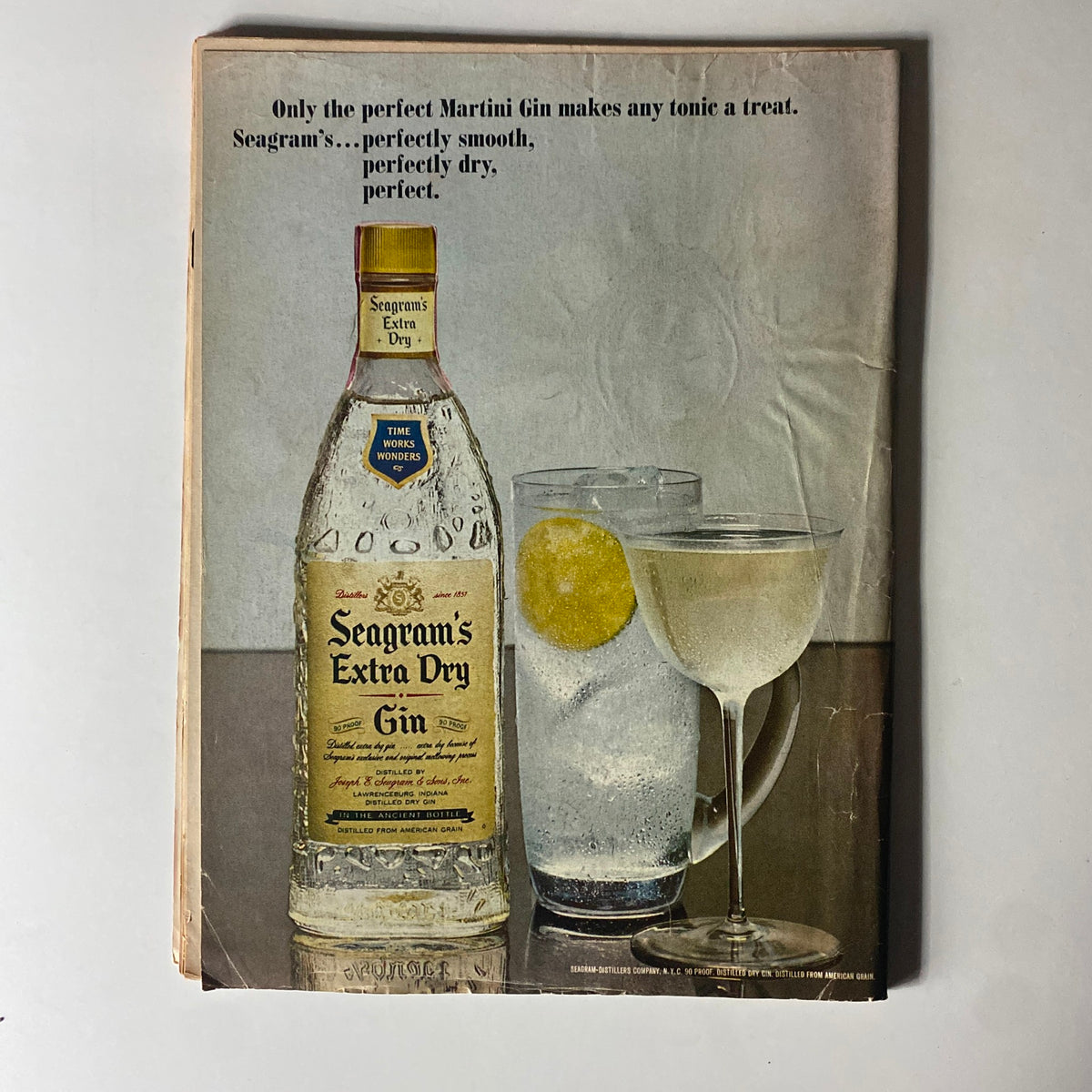 Back cover of Time Magazine from August 13, 1965, featuring an advertisement for Seagram's Extra Dry Gin, emphasizing its smoothness and quality for making Martinis.