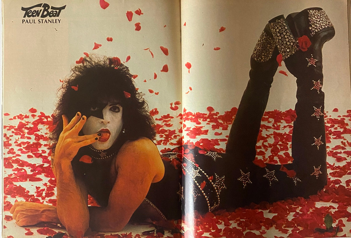 Teen Beat Magazine April 1981 featuring Paul Stanley of Kiss in a glamorous photo amidst rose petals, portraying the iconic rockstar's playful demeanor.