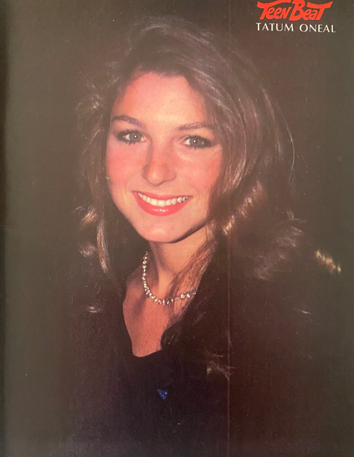 Teen Beat Magazine feature of Tatum O'Neal, showcasing her charming smile and long hair, from the November 1981 issue.