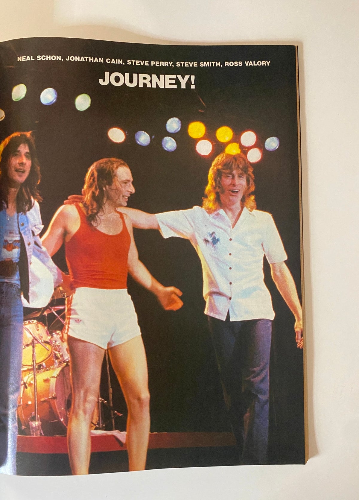 Journey band members performing live, showcasing the iconic music era, featured in Tiger Beat Magazine August 1982.