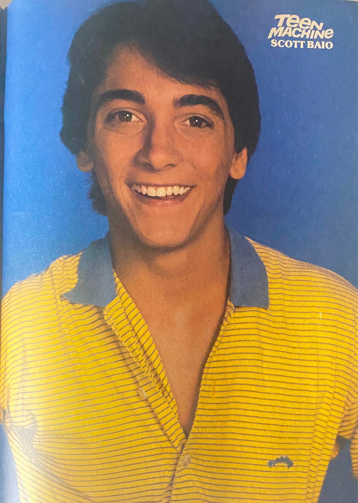 Scott Baio smiling in a yellow striped shirt, featured in Teen Machine Magazine December 1981.