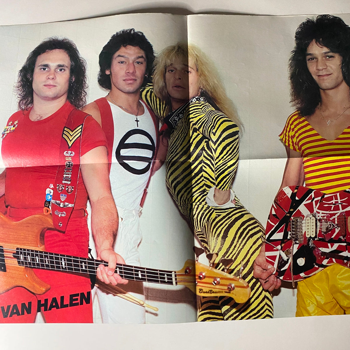 Vintage 1982 Tiger Beat Poster Special Magazine featuring a colorful photo of the rock band Van Halen in vibrant outfits, showcasing their iconic 80s style.