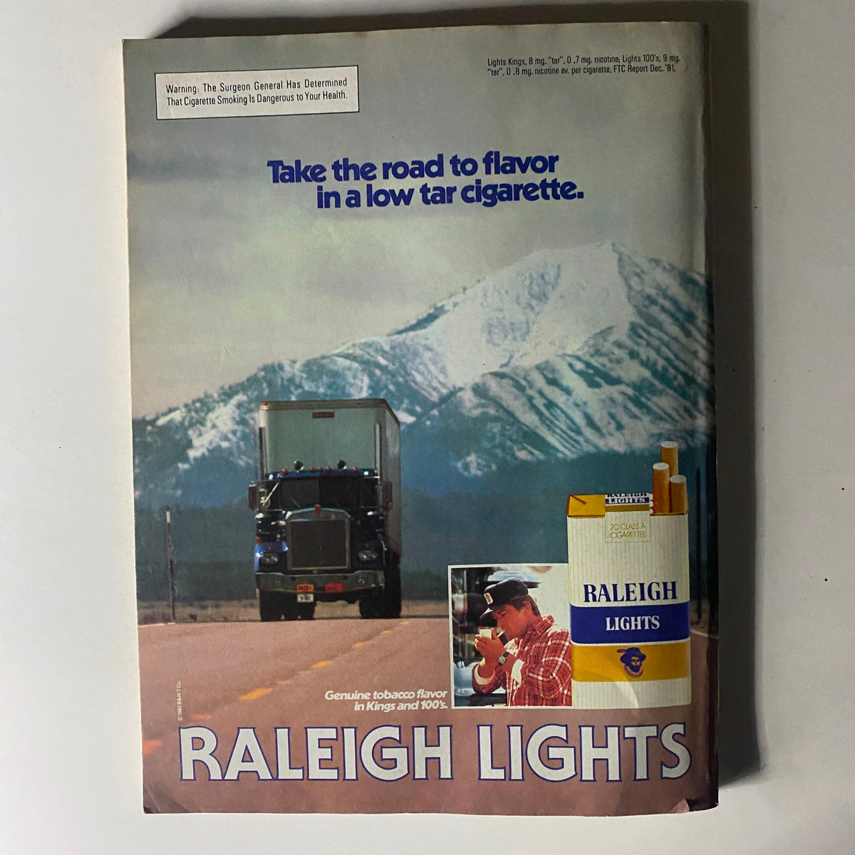 Back cover advertisement from the 1983 Street and Smith's Official Yearbook Baseball featuring Raleigh Lights cigarettes.