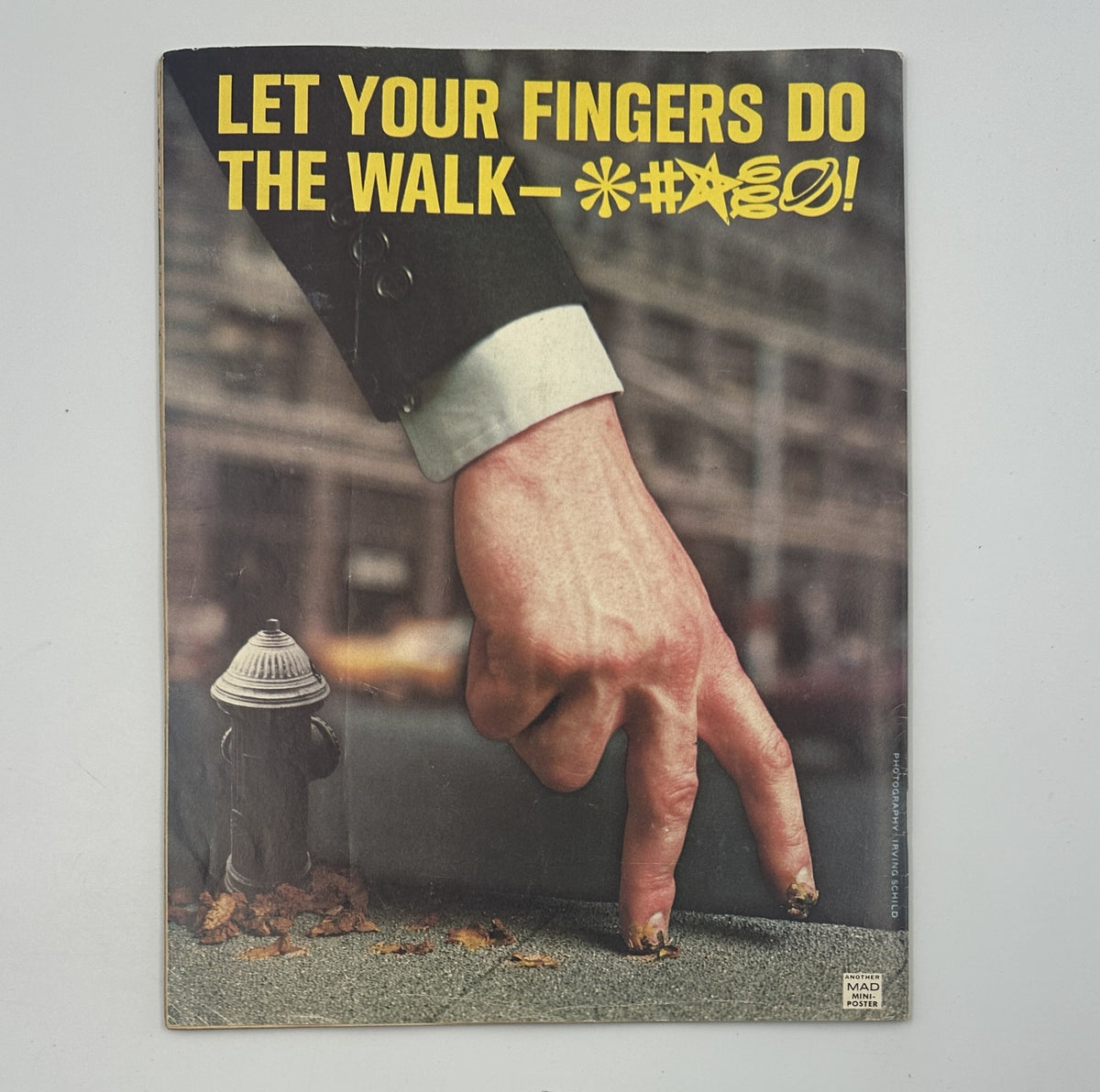 Cover of MAD Magazine No. 184, July 1976, depicting a giant hand with fingers as legs walking, captioned 'LET YOUR FINGERS DO THE WALK—*#@!'.