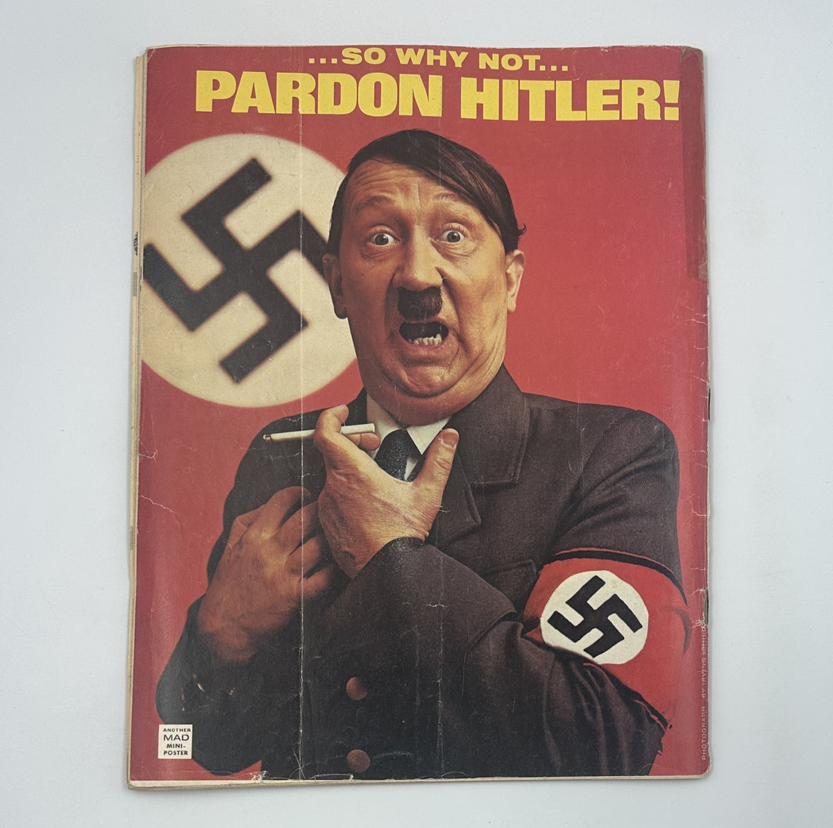 Back cover of MAD Magazine No. 172, January 1975, featuring a satirical illustration with a character in a Nazi uniform captioned '...so why not... Pardon Hitler!' showcasing controversial humor.