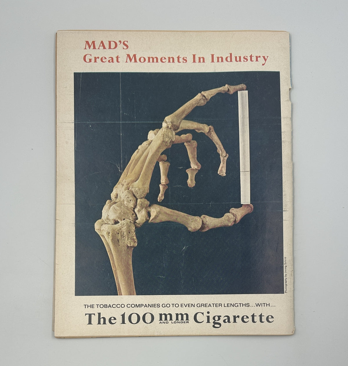 Cover of MAD Magazine No. 118 from April 1968, featuring a humorous headline 'MAD's Great Moments In Industry' with a skeletal hand holding a cigarette. This magazine highlights comedic satire within its content, including the feature 'Mission Ridiculous'.