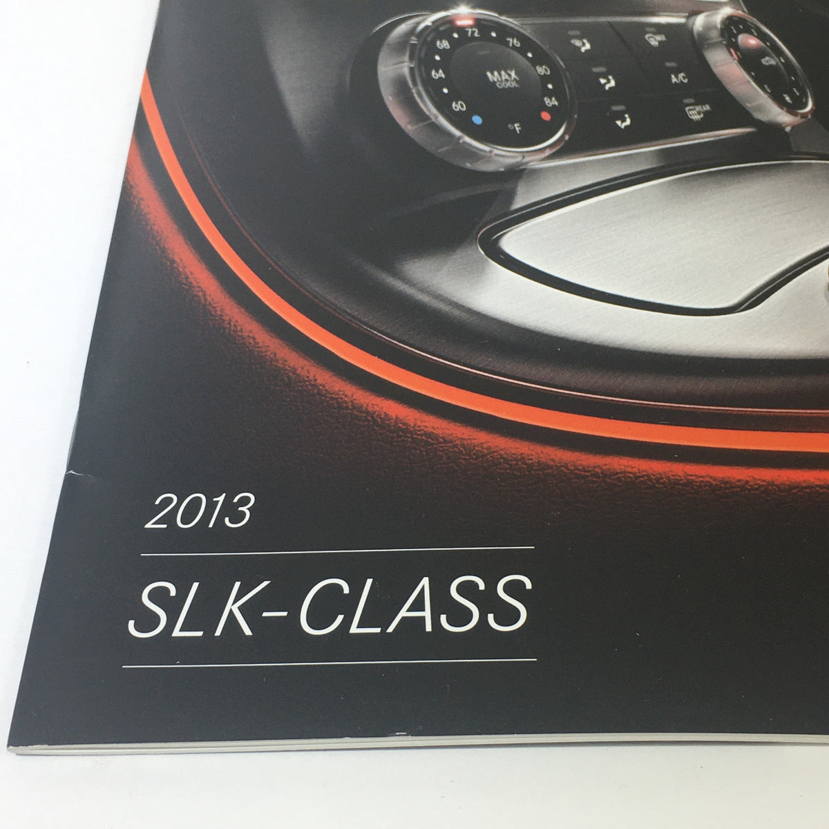 Close-up of the 2013 Mercedes-Benz SLK-Class Dealership Car Auto Brochure Catalog cover showcasing the SLK-Class branding.