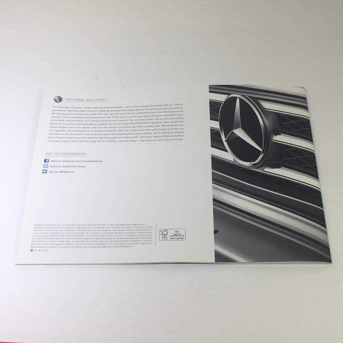 Back cover design highlighting the Mercedes-Benz logo in the 2013 Mercedes-Benz G-Class 4x4 AMG Dealership Car Auto Brochure Catalog.