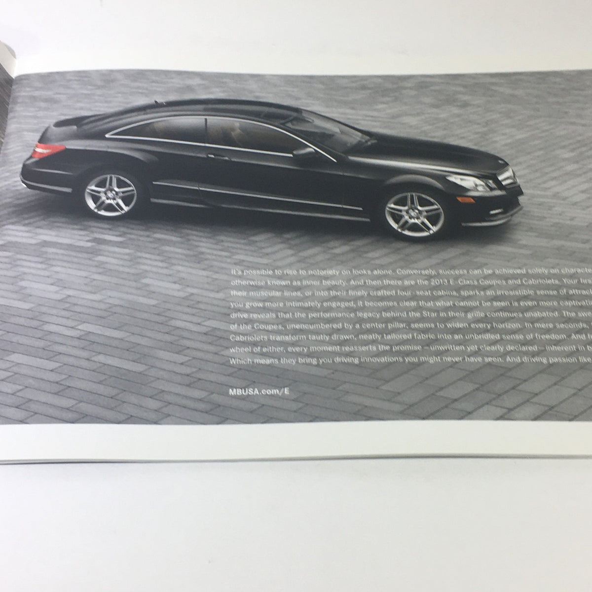2013 Mercedes-Benz E-Class Coupe Cabriolet Dealership Car Auto Brochure Catalog interior page showcasing the side view of a black E-Class Coupe.