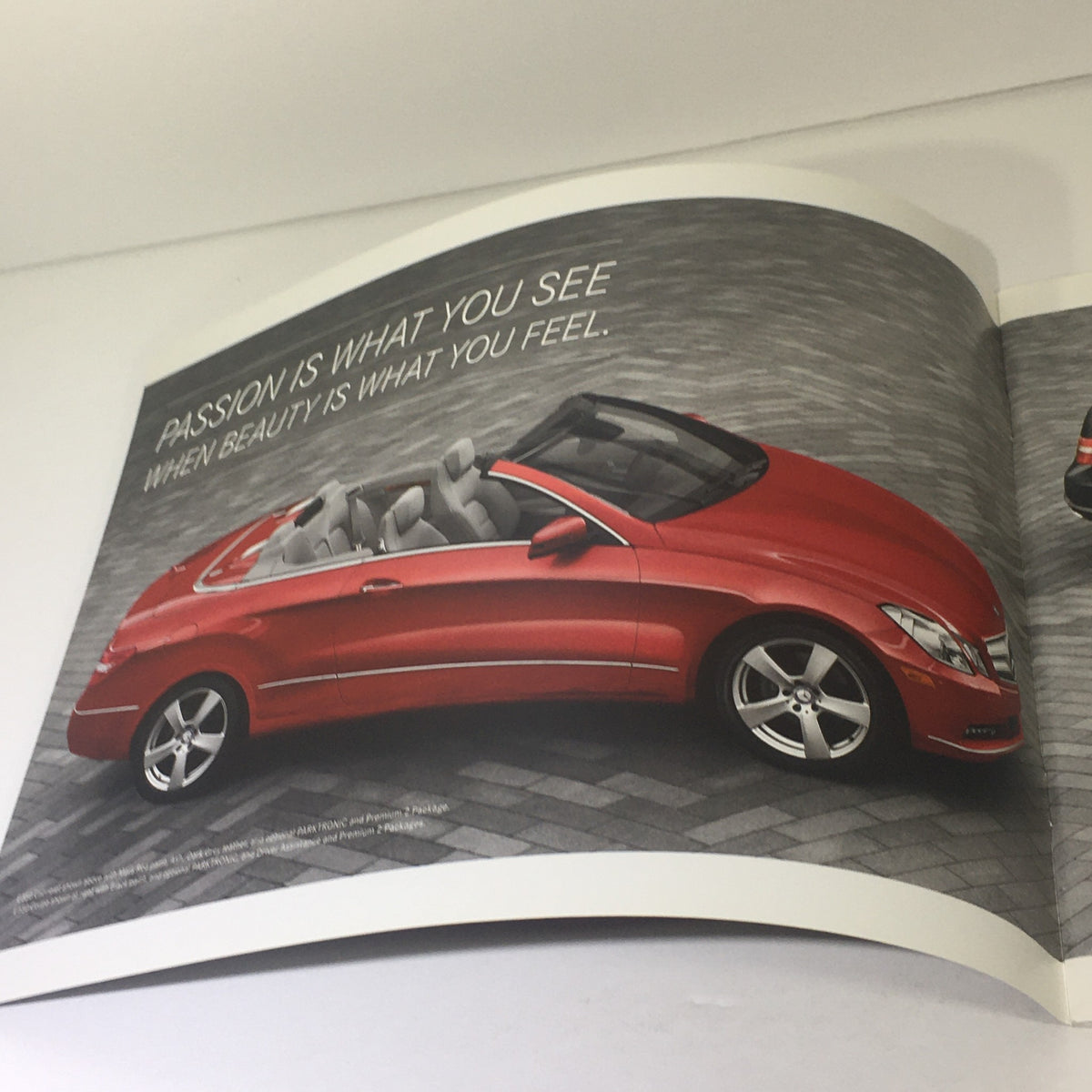 2013 Mercedes-Benz E-Class Coupe Cabriolet Dealership Car Auto Brochure Catalog showcasing a red convertible car on a stylish paved driveway.
