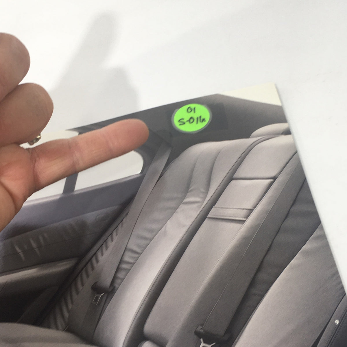 A detail shot of the interior seating from the 2001 Mercedes-Benz S-Class brochure, highlighting luxurious materials with a marker pointing to section S-01a.