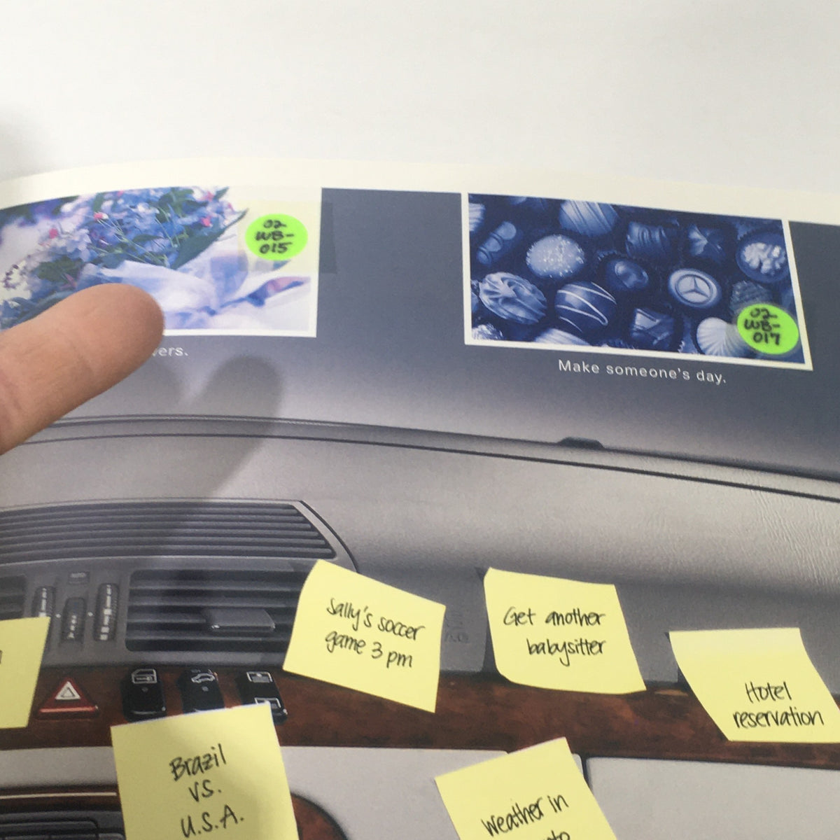 Interior view page of the 2001 Mercedes-Benz E-Class Dealership Car Auto Brochure Catalog featuring flowers and a Mercedes-themed image with sticky notes.