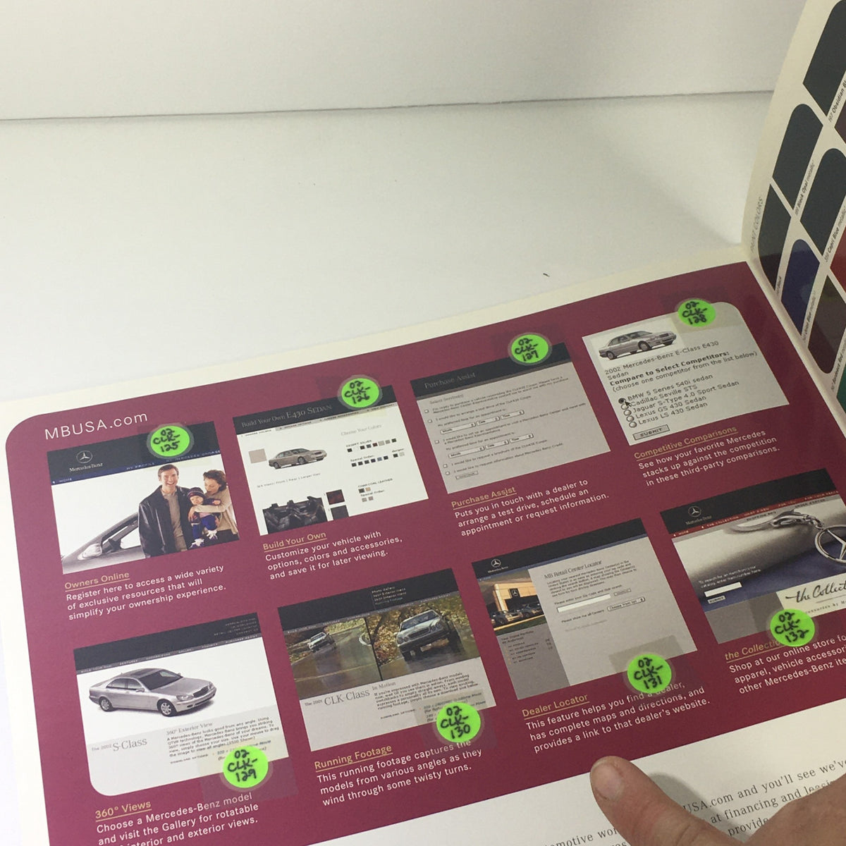 Interior page of the 2002 Mercedes-Benz CLK-Class Dealership Car Auto Brochure showing various website links and features related to the CLK-Class.