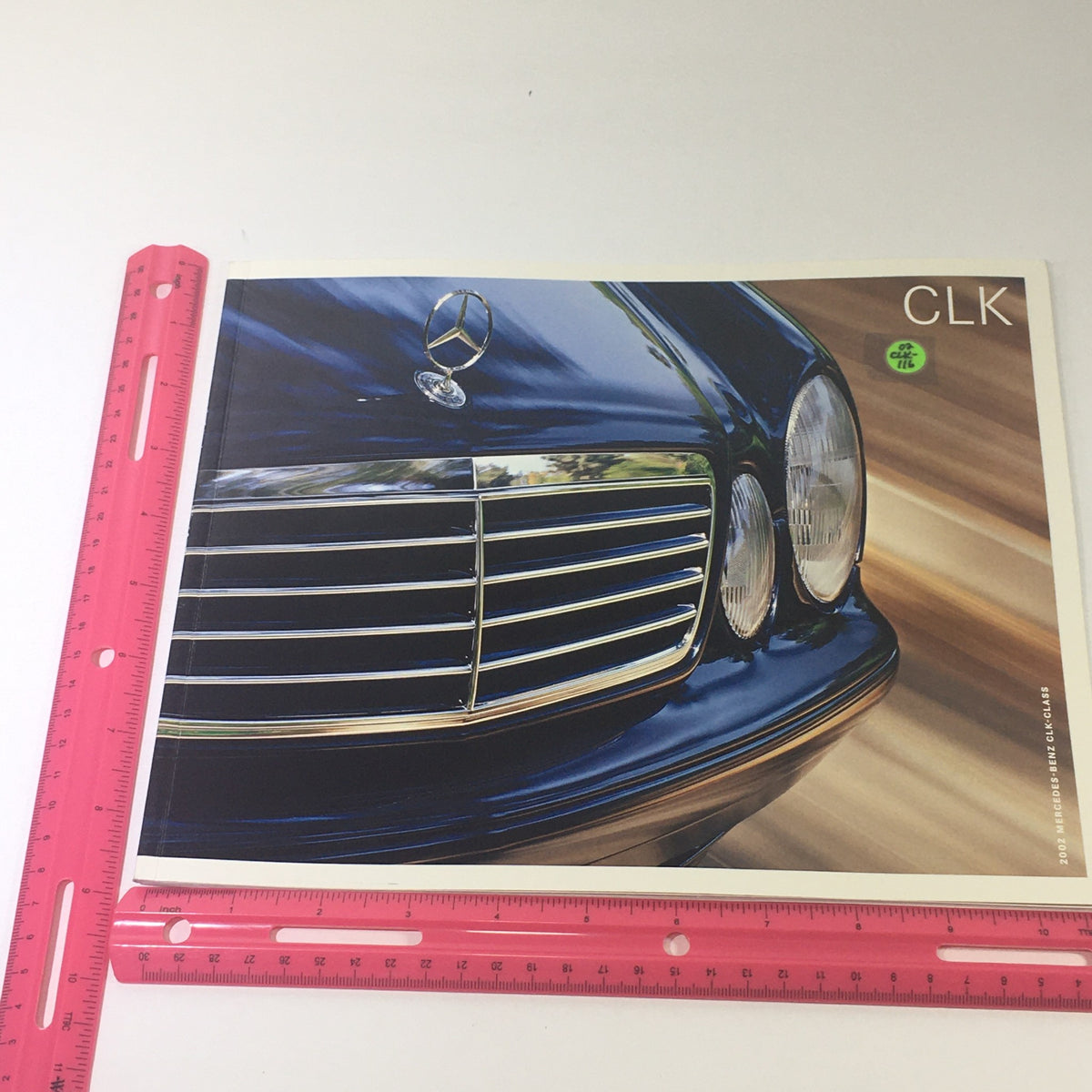 2002 Mercedes-Benz CLK-Class Dealership Car Auto Brochure Catalog highlighting the front grille and exterior design of the CLK.