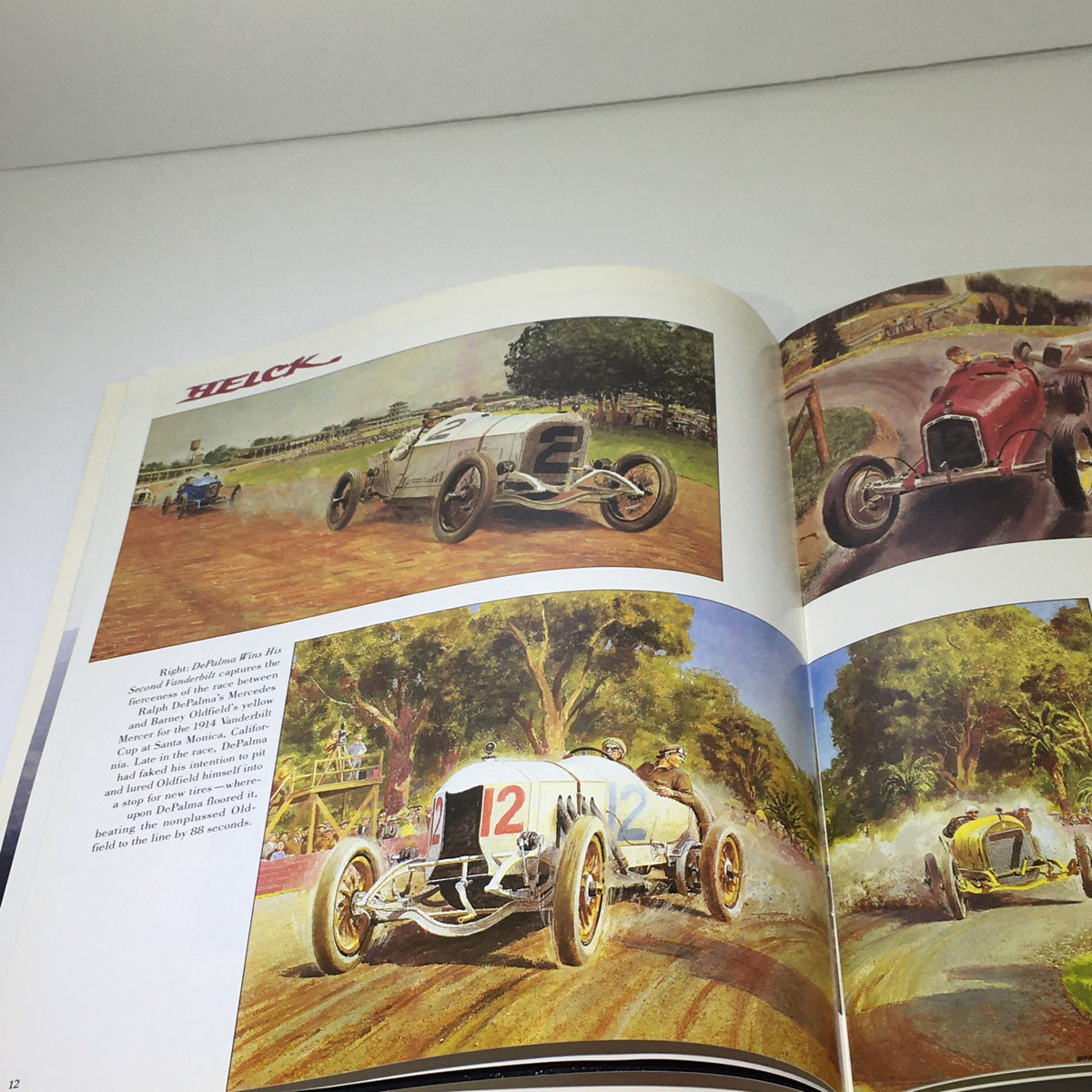 Interior page showing colorful artwork of vintage racing cars from the 1983 Mercedes-Benz Volume VIII Dealership Car Auto Brochure Catalog, highlighting racing history.