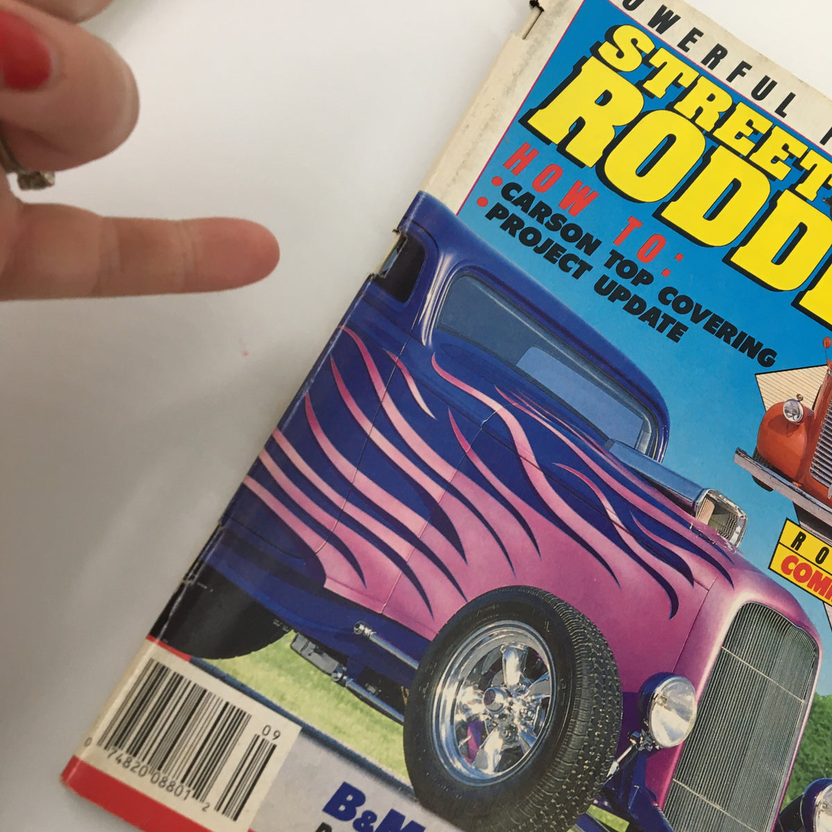 Close-up view of the cover of VTG Street Rodder Magazine September 1989 highlighting the B&M Brizio Project, displaying the iconic purple street rod with flame designs.