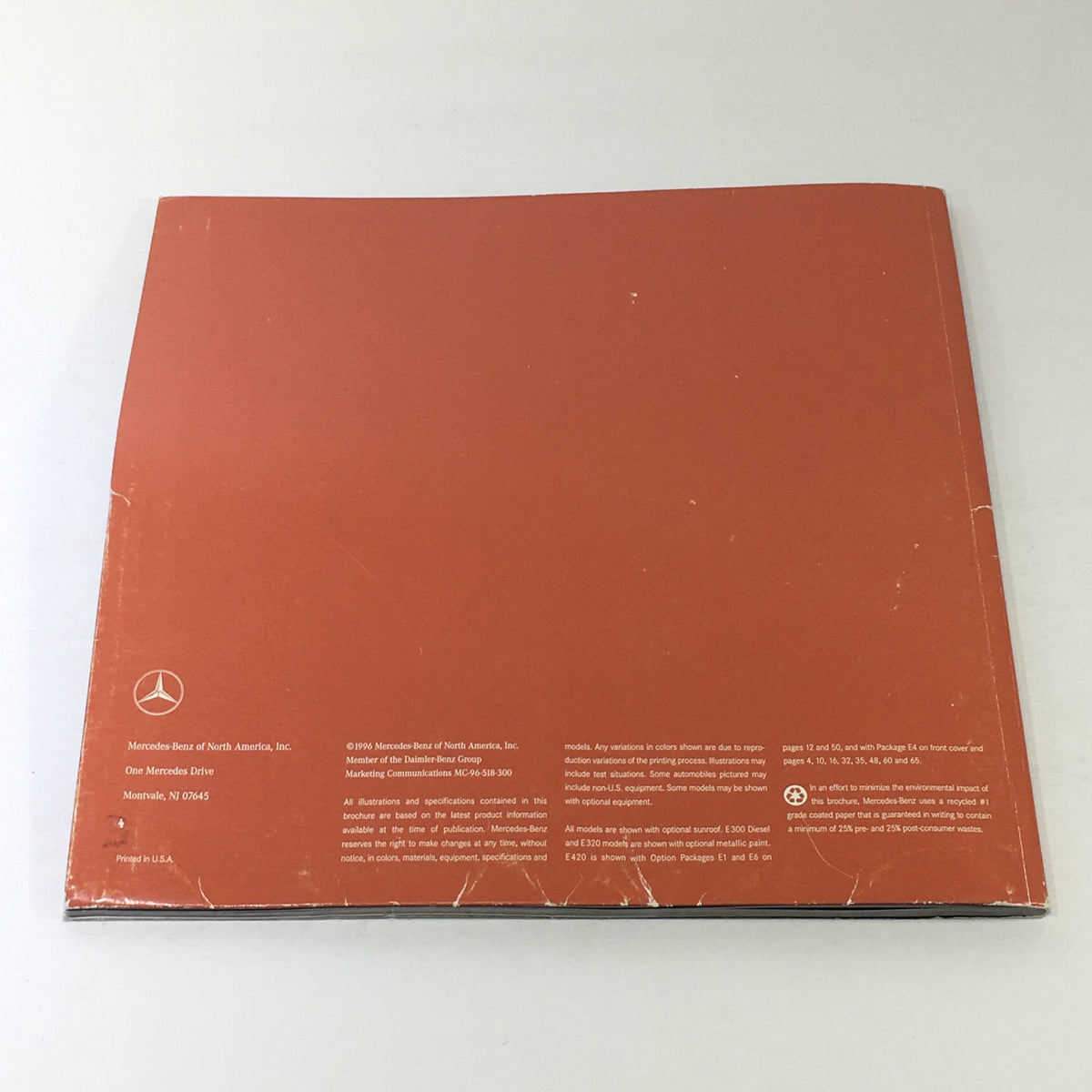 Back cover of the 1997 Mercedes-Benz E Class Coupe dealership car auto brochure catalog, displaying formal branding and publication details.