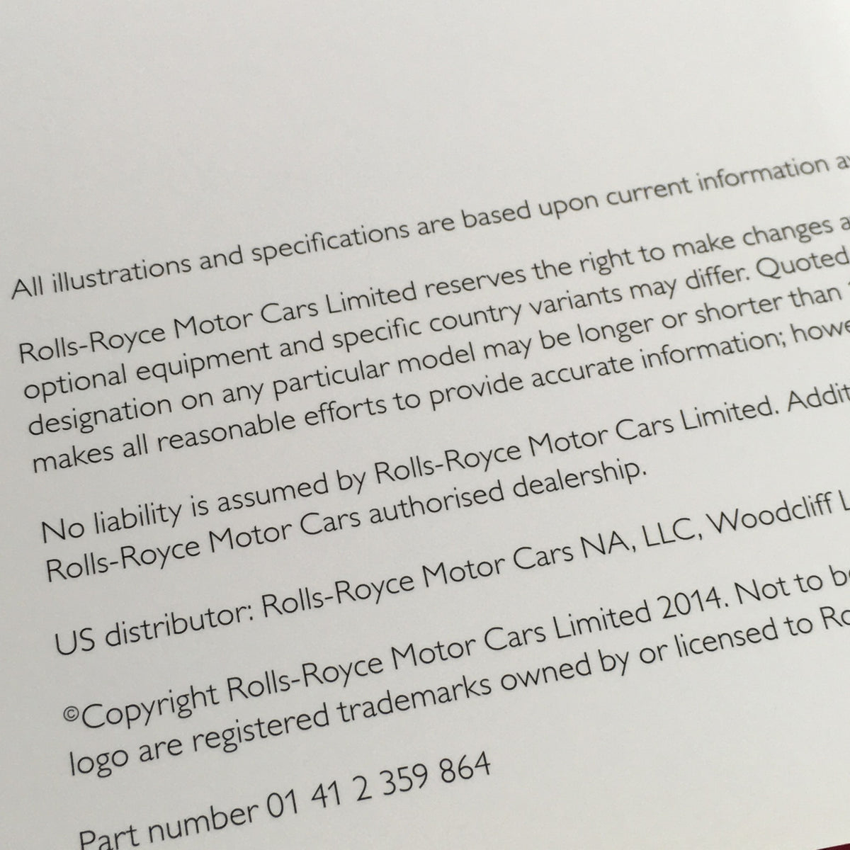 Inside page of the 2014 Rolls Royce Ghost Family Dealership Car Auto Brochure Catalog containing copyright and disclaimer information.