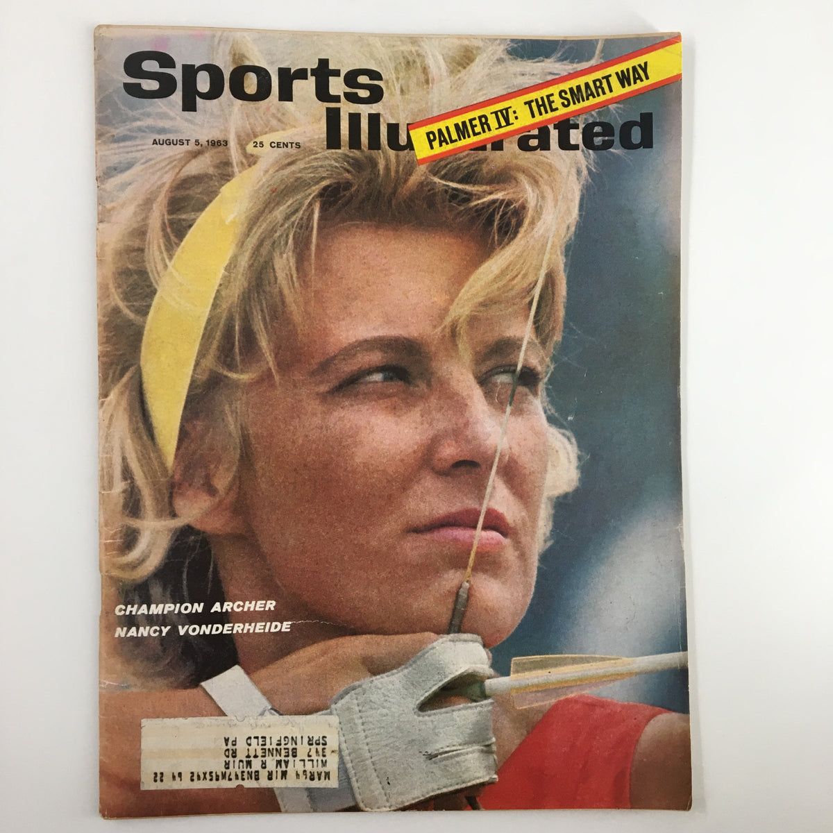 Vintage Sports Illustrated Magazine cover from August 5, 1963 featuring champion archer Nancy Vonderheide, showcasing her skills in archery.