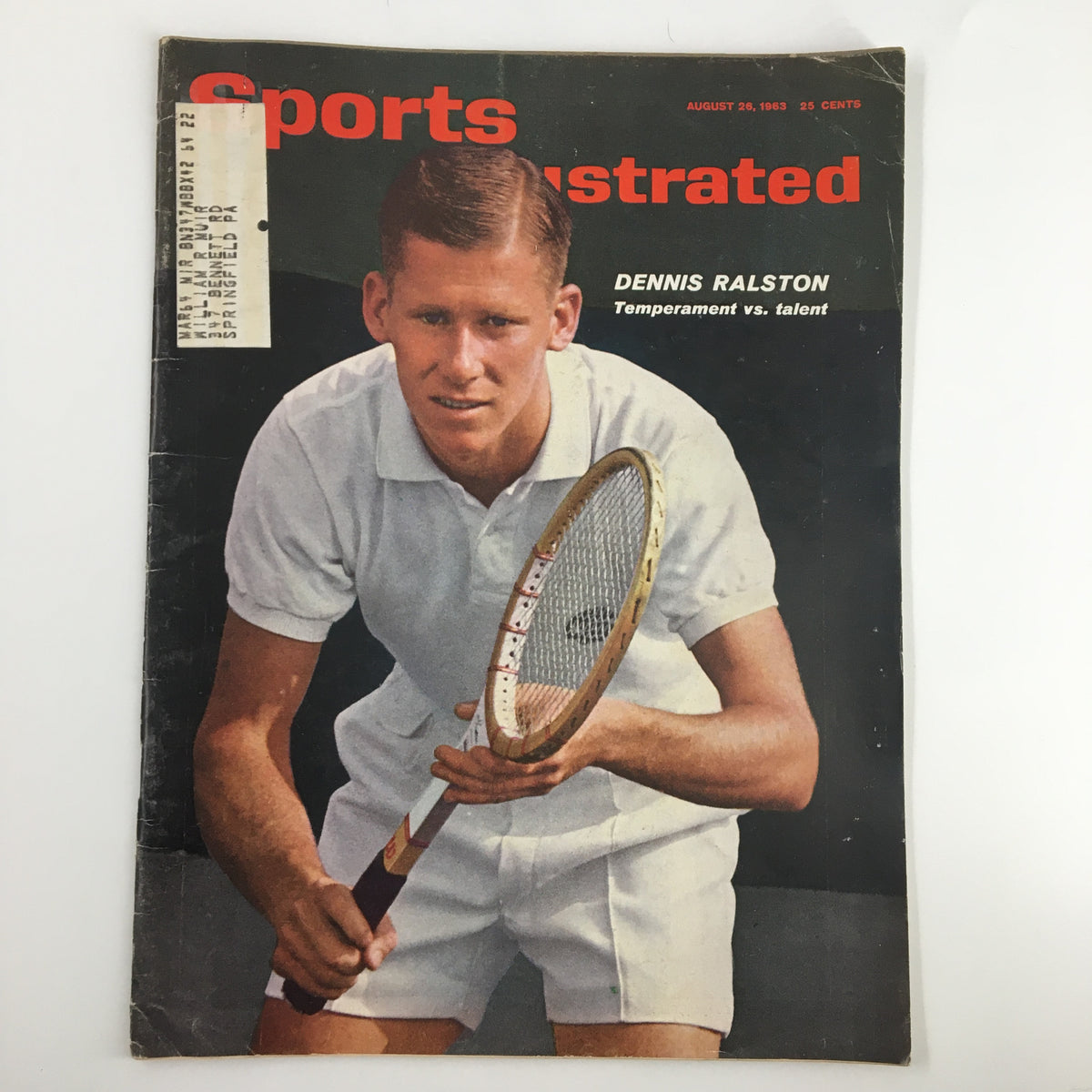 Vintage Sports Illustrated Magazine featuring Dennis Ralston on the cover, dated August 26, 1963, showcasing the tennis player with a racket in hand, reflecting a nostalgic moment in sports history.