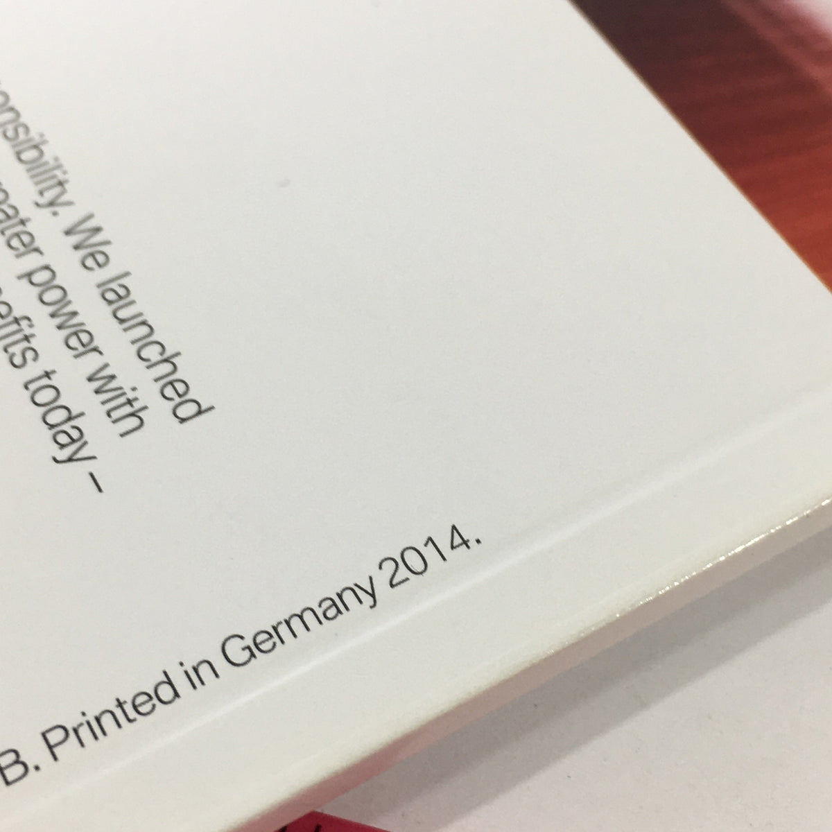 Printed details on the spine of the 2014 BMW M5 Dealership Car Auto Brochure Catalog, indicating it was printed in Germany in 2014.