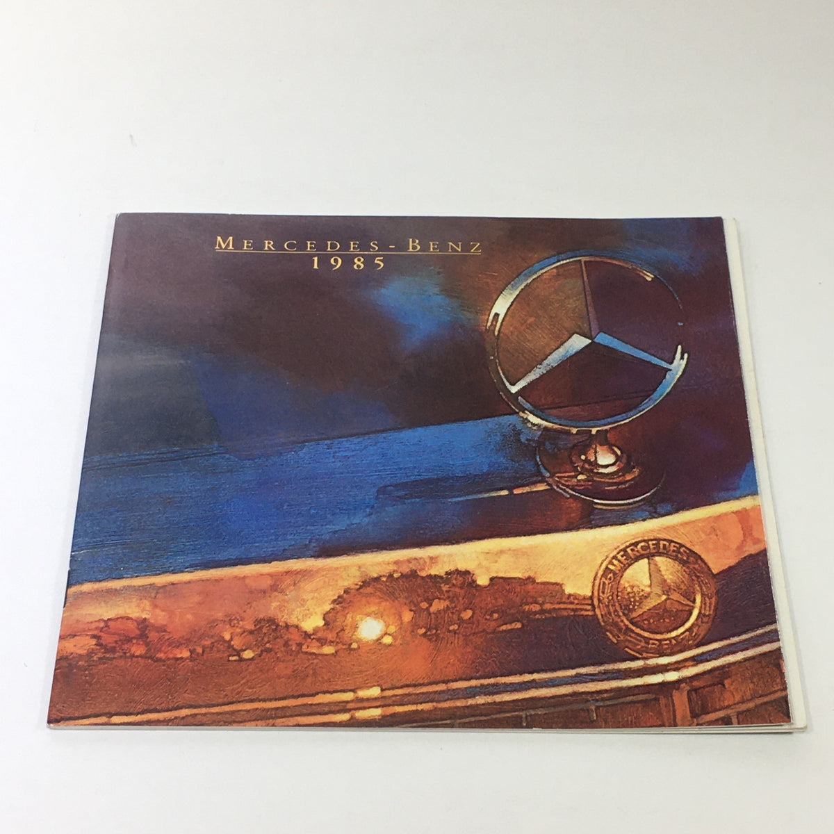 1985 Mercedes-Benz SD SE SL SEL SEC Class Dealership Car Auto Brochure Catalog cover featuring the iconic Mercedes-Benz emblem and stylish design.