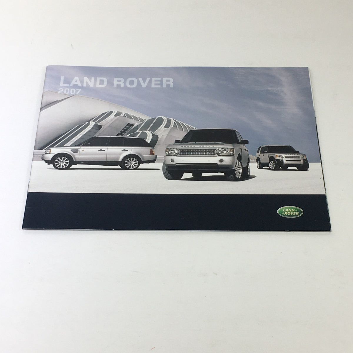 2007 Land Rover American Cherry Dealership Car Auto Brochure Catalog cover featuring multiple Land Rover vehicles against a modern architectural backdrop.