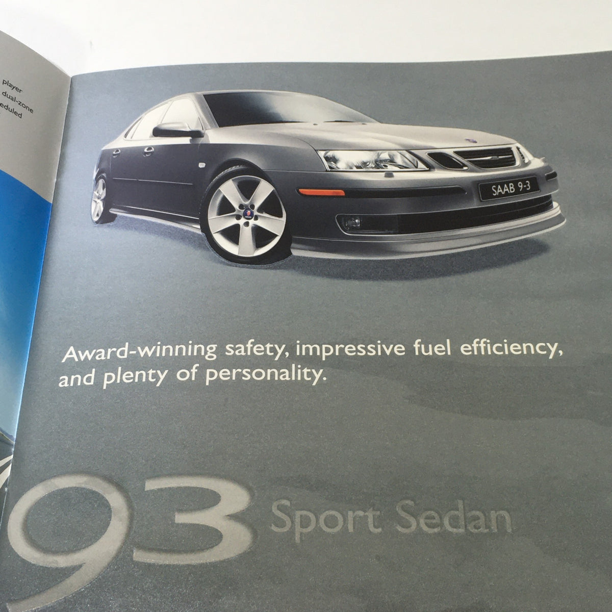 Detailed image of the 2007 Saab 93 Sport Sedan showcasing its award-winning safety features, fuel efficiency, and personality as seen in the dealership car auto brochure.