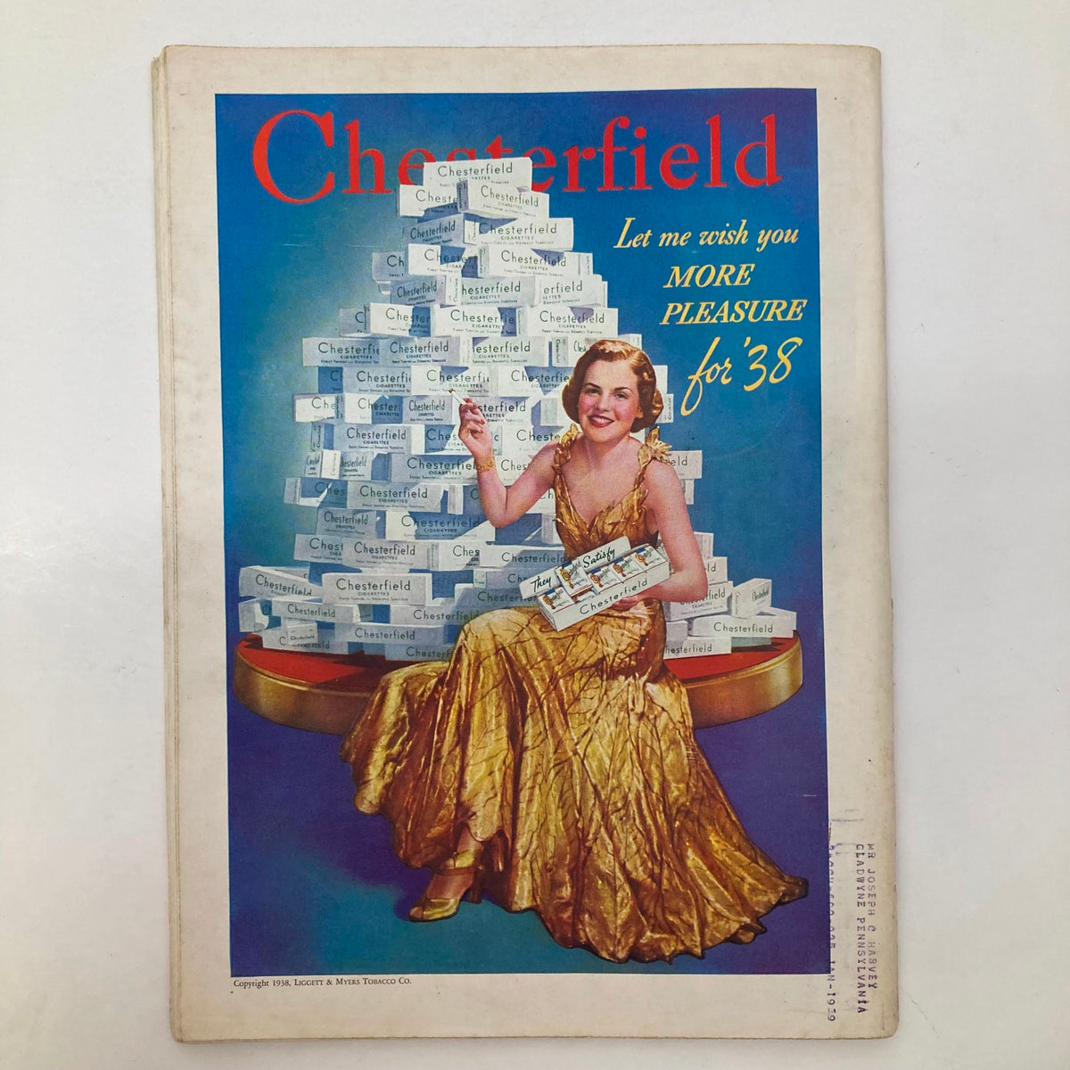 Advertisement page in VTG Time Magazine January 10 1938 featuring Chesterfield cigarettes with a glamorous model, emphasizing vintage marketing aesthetics of the time.