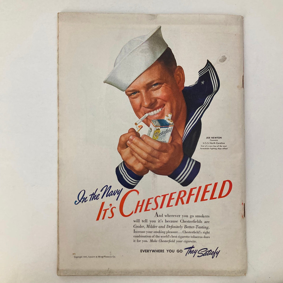 Advertisement page from the vintage Time Magazine from July 21, 1941, promoting Chesterfield cigarettes with a U.S. Navy sailor, embodying wartime marketing.