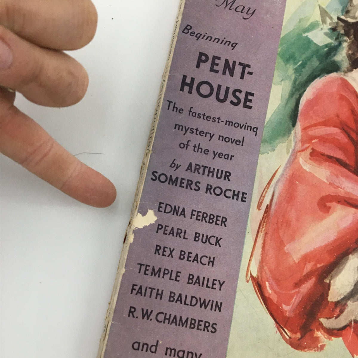 Close-up of the May 1933 issue of Hearst's International with Cosmopolitan Magazine showcasing the beginning of the mystery novel 'Penthouse' by Arthur Somers Roche, highlighting authors featured within.
