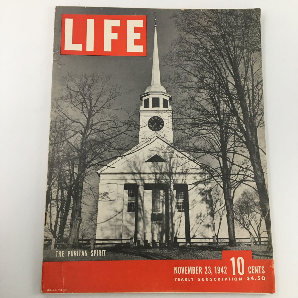 VTG Life Magazine November 23 1942 featuring the Puritan Spirit on the cover, showcasing a church with a clock tower surrounded by trees, in black and white with red accents, priced at 10 cents.