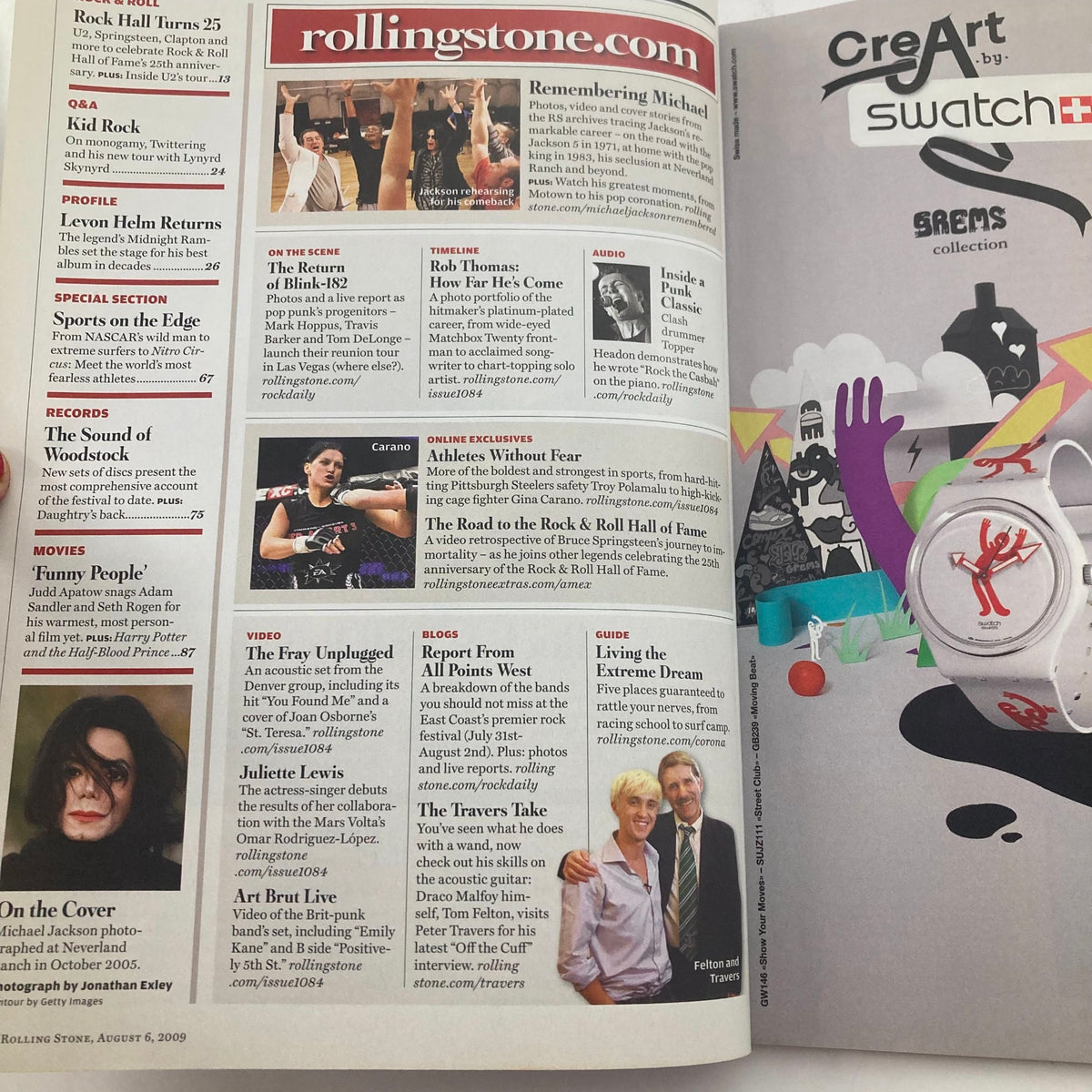 Inside view of Rolling Stone Magazine August 6 2009 Issue 1084 featuring Michael Jackson and Rob Thomas with articles and features about their contributions to music.