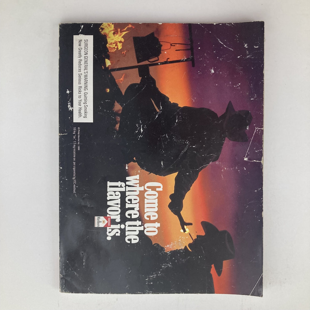 Back cover of Playboy Magazine April 1999 featuring a vintage advertisement with silhouettes, compelling design, and nostalgic elements that reflect its time.