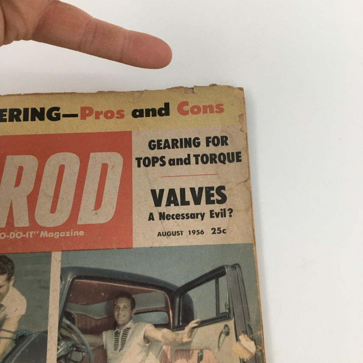 Close-up of the Hot Rod Magazine August 1956 cover, emphasizing the title 'Power Steering - Pros and Cons' and additional features like 'GEARING FOR TOPS and TORQUE' and 'VALVES A Necessary Evil?'