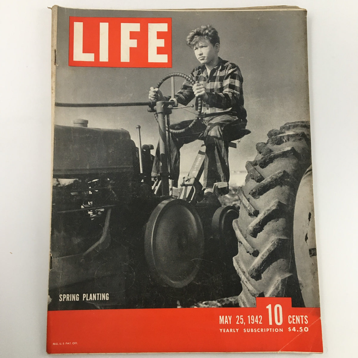 VTG Life Magazine May 25, 1942 featuring a cover image of a boy driving a vintage tractor, highlighting the theme of spring planting.