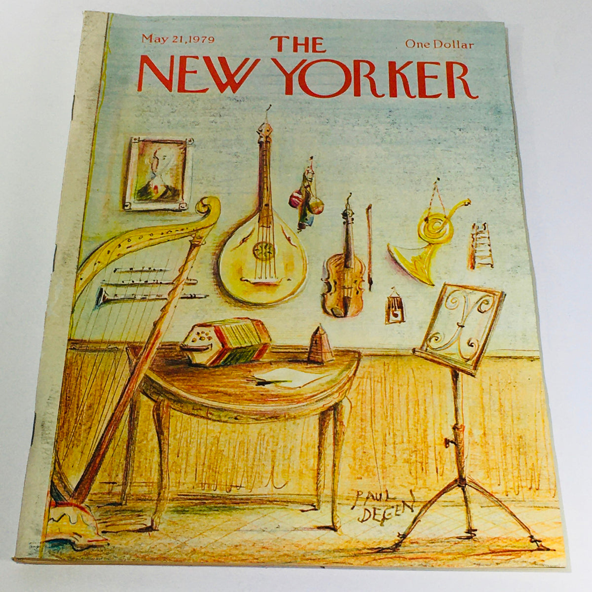 The New Yorker May 21, 1979 magazine cover featuring an artistic illustration by Paul Degen, showcasing various musical instruments and a writing desk, embodying the cultural essence of the late 1970s.