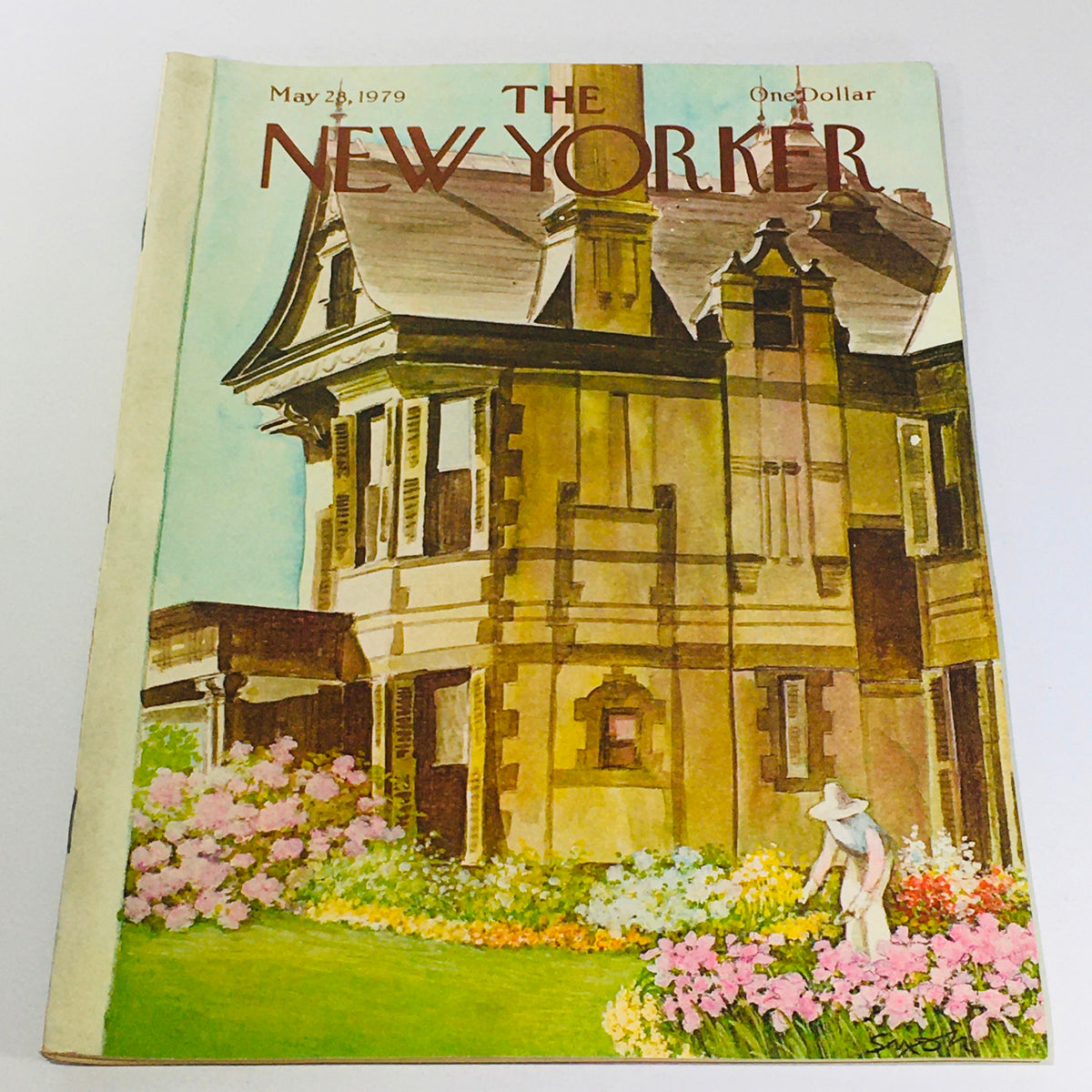Cover of The New Yorker magazine dated May 28, 1979, featuring an illustrated scene of a gardener tending to flowers in front of a vintage building, designed by Charles Saxon.