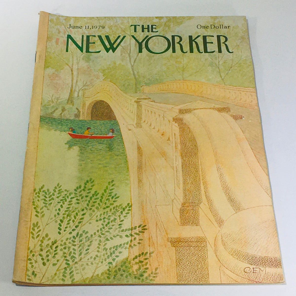 The New Yorker: June 11, 1979 full magazine cover featuring an illustrated scene of a bridge and a canoeist, designed by Charles E. Martin, showcasing a vintage aesthetic.