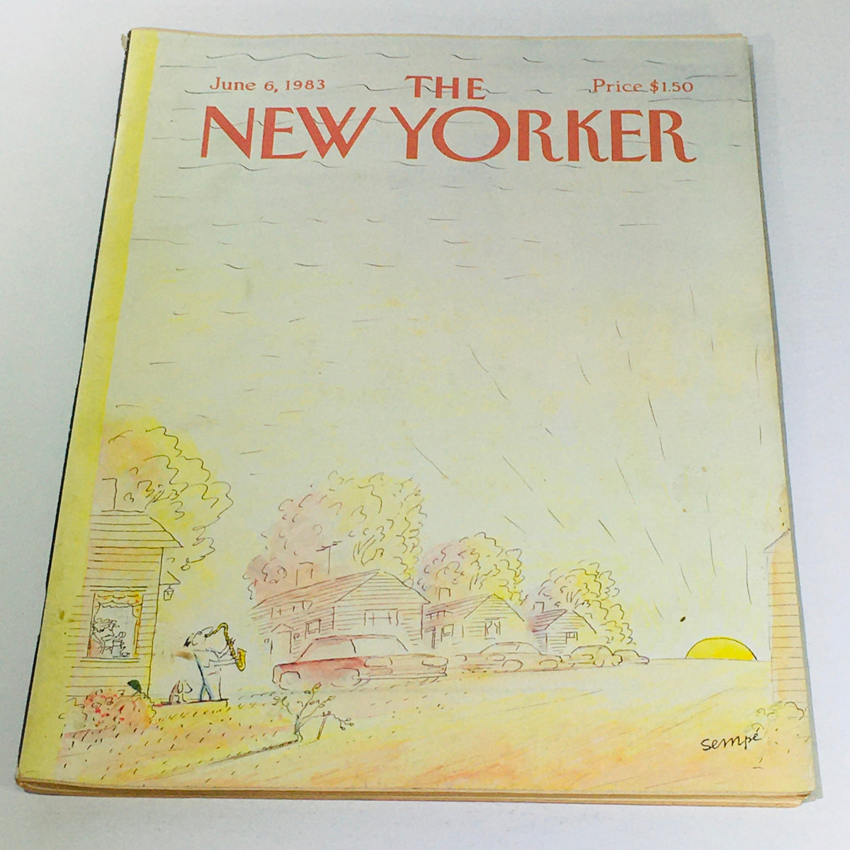 Cover of The New Yorker: June 6 1983 featuring a whimsical illustration by Jean-Jacques Sempe, depicting a serene scene with houses, a saxophonist, and a sunset.