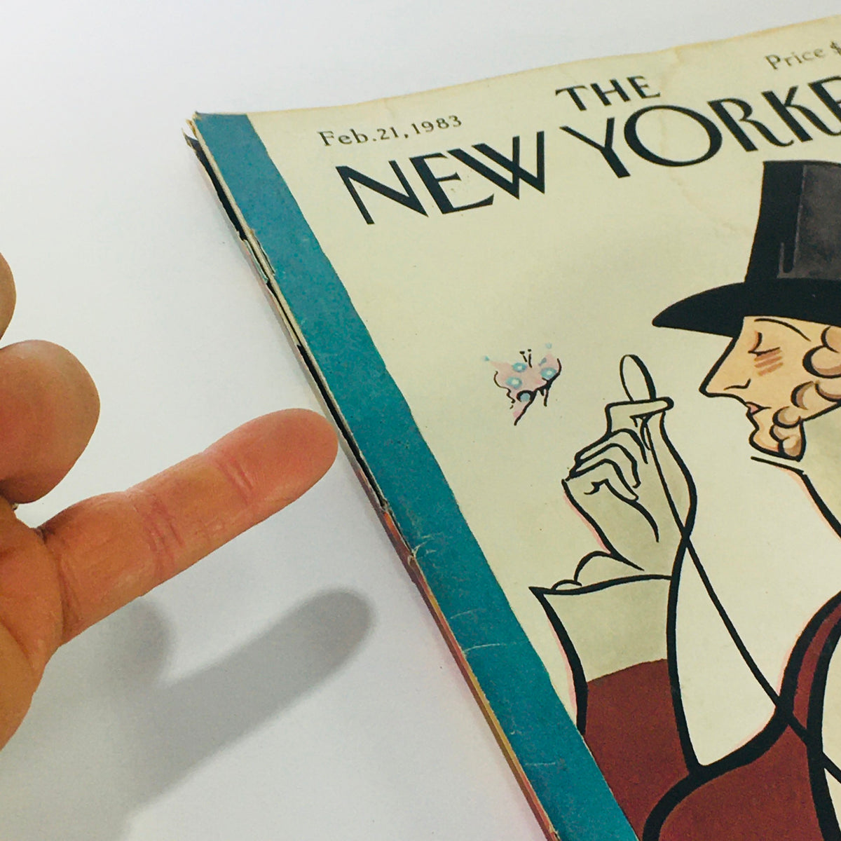 Detailed view of The New Yorker magazine cover from February 21, 1983, illustrating the character's gesture and vibrant colors of the cover art by Rea Irving.