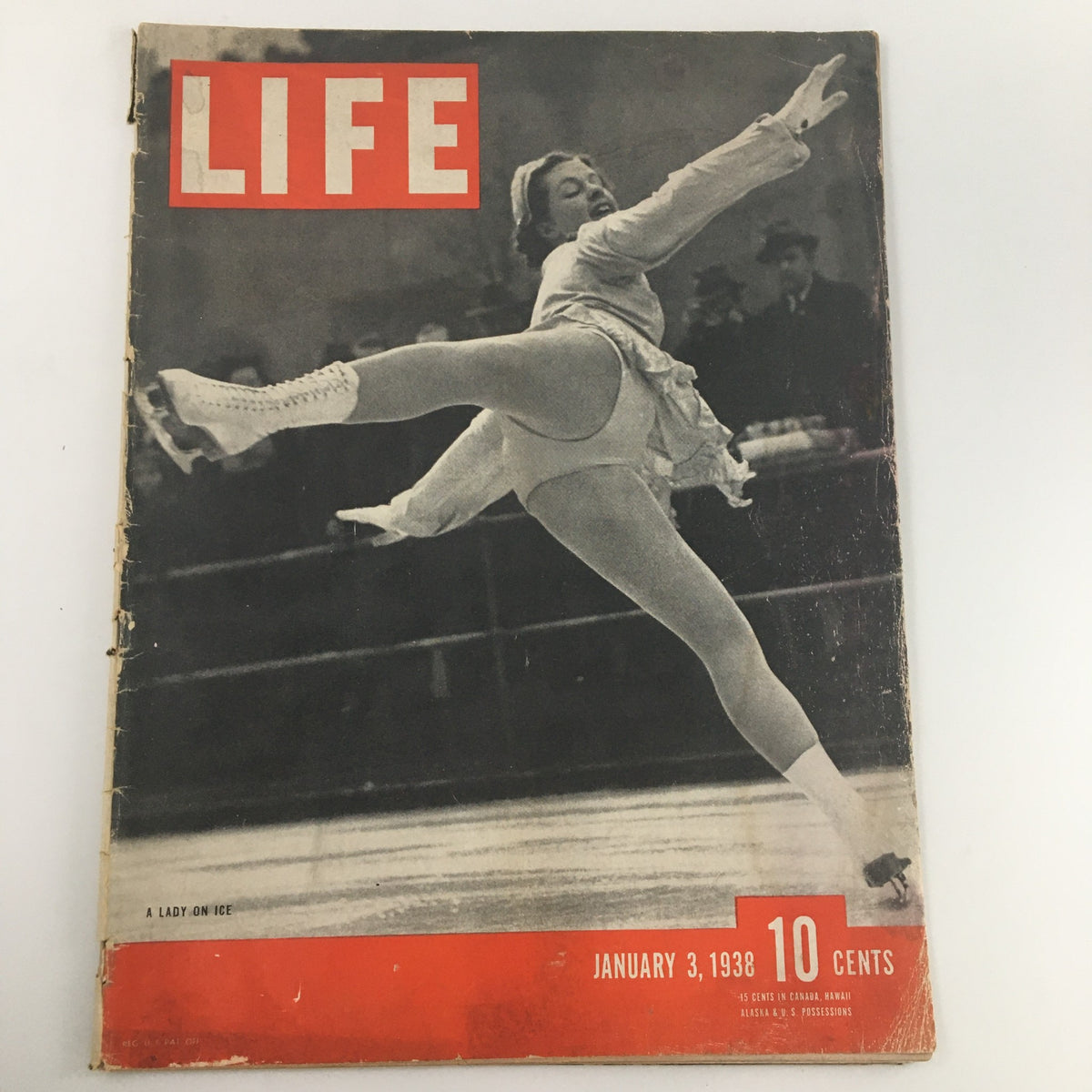 Vintage Life Magazine cover from January 3, 1938, featuring a dazzling image of a figure skater titled 'A Lady on Ice' showcasing elegance and skill, perfect for collectors of historical publications.