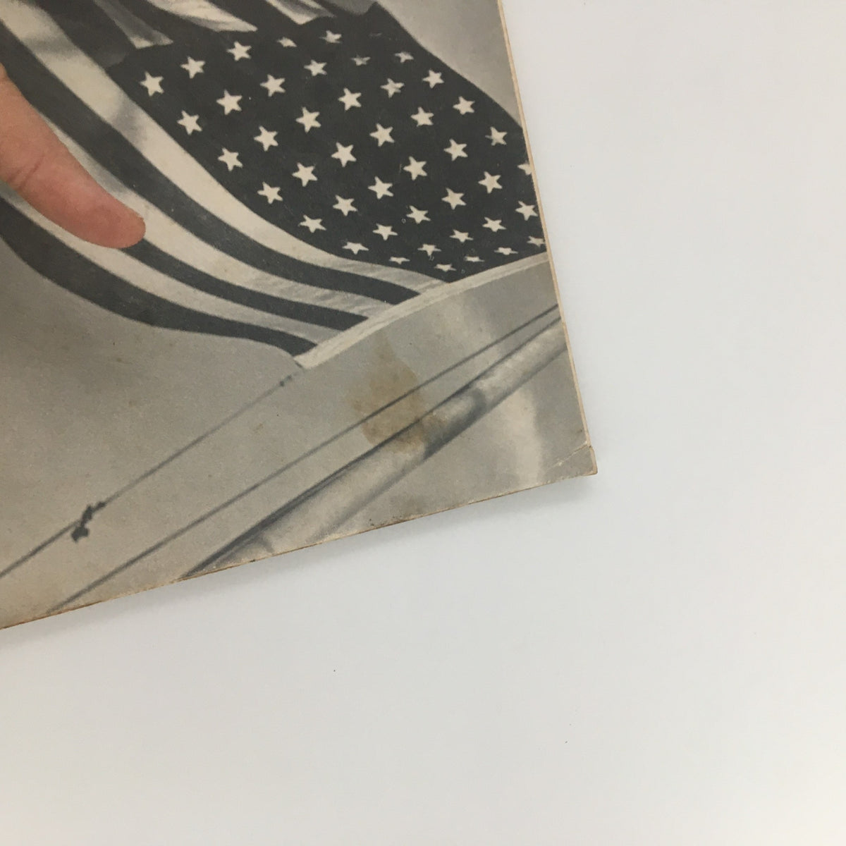 Close-up of the U.S. Flag on the cover of VTG Life Magazine April 14 1941, highlighting details of the vintage publication.