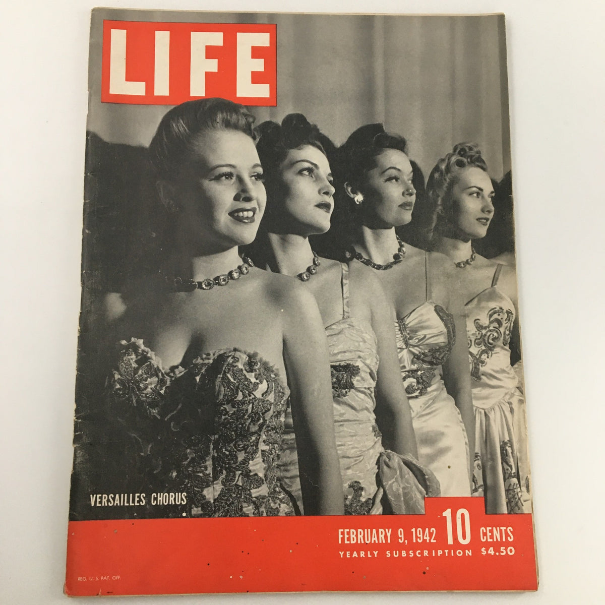 Cover of VTG Life Magazine February 9, 1942 featuring the Versailles Chorus, highlighting women in elegant dresses with a focus on arts and culture during World War II.